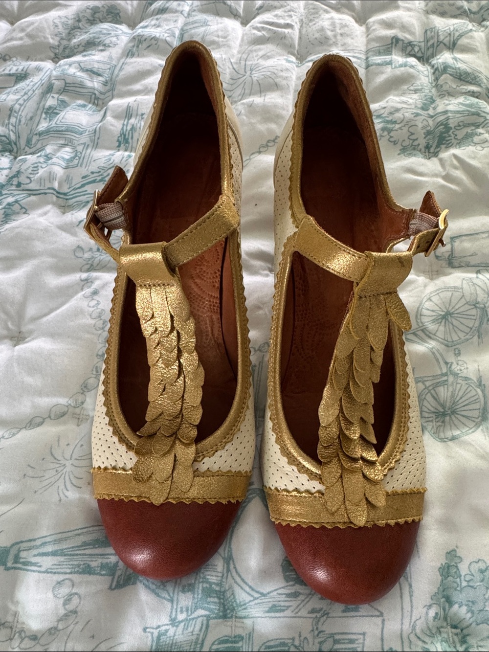 Chie Mihara White and Gold T‑Strap Heels with Brown Toe